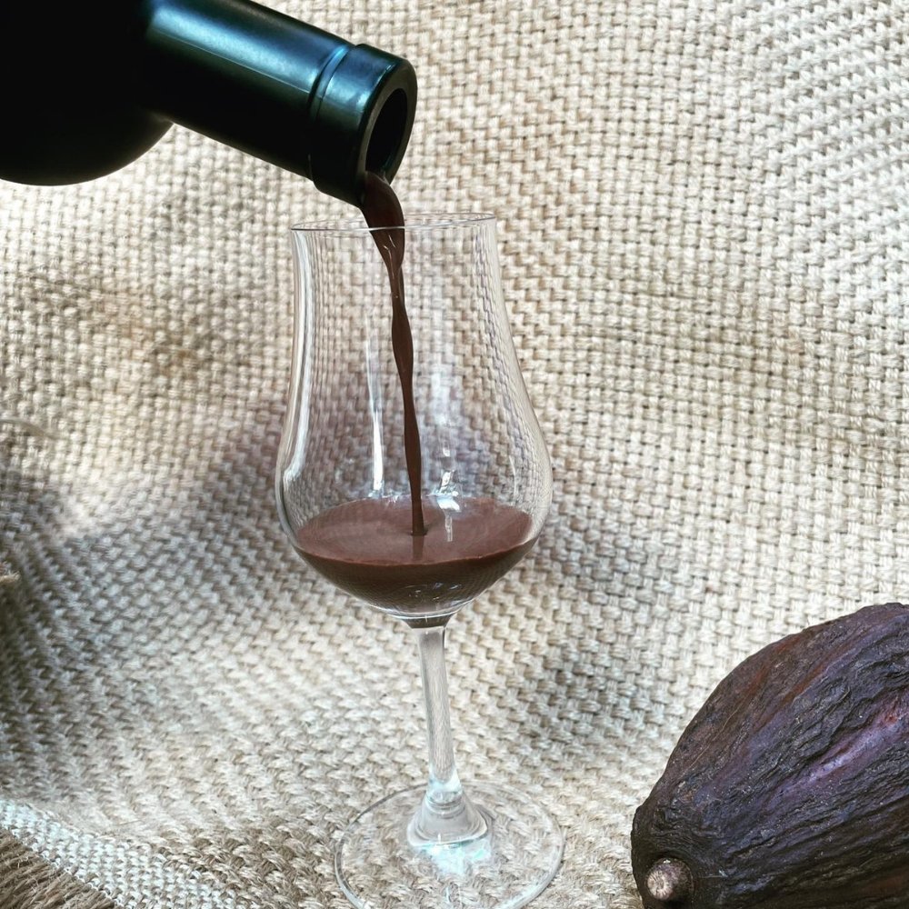 Bottle of Acan Chocolate Liqueur by Conspiracy Chocolate - BetterThanFlowers